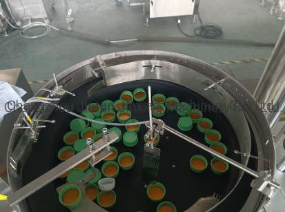 Productos para el cuidado del cabello Botella redonda Máquina de tapón lineal totalmente automática